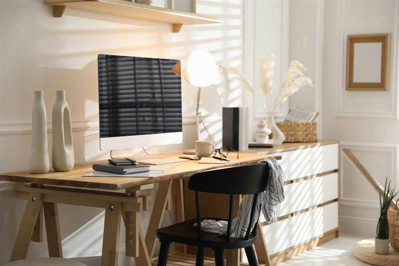 Comfortable workplace with computer in home office