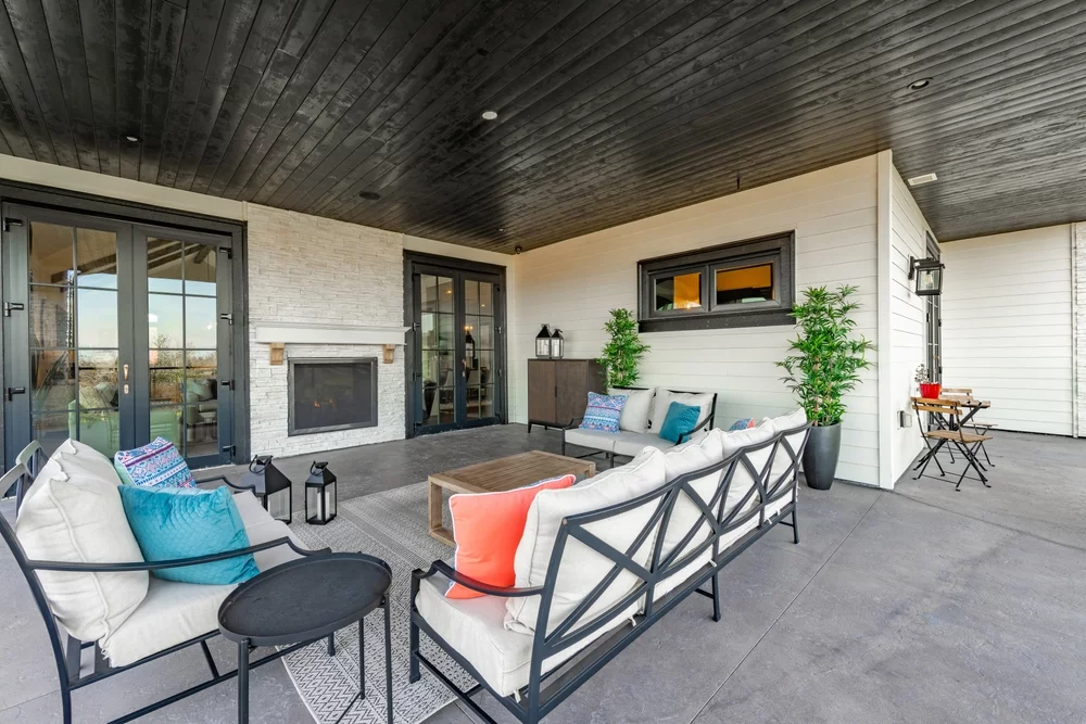 Patio with coastal outdoor furniture
